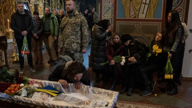 A funeral in Kyiv for Ukrainian journalist Maks Levins