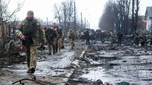 Ukrainian forces in Bucha, just outside of Kyiv