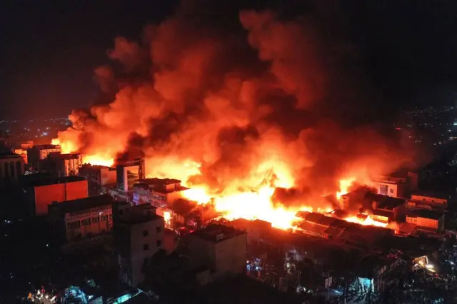 This aerial view shoes plumes of smoke billowing from the site of a fire that broke out at the Waaheen market in Hargeisa, Somaliland, on April 2, 2022