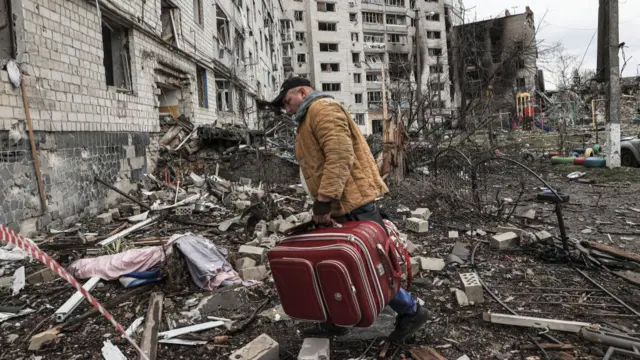 People return to their destroyed homes in Borodyanka.