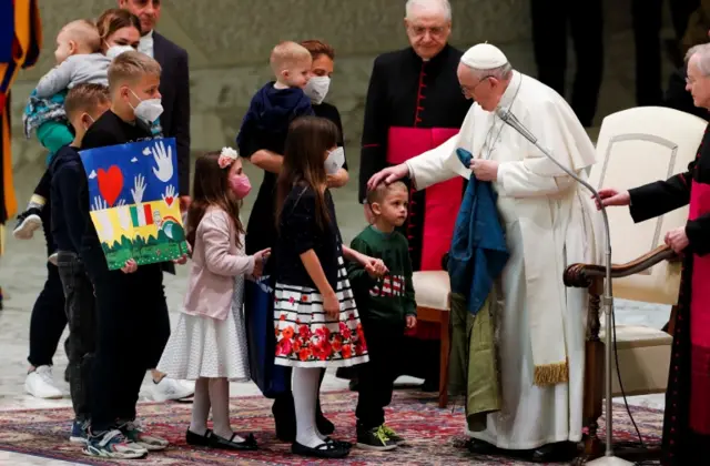 Pope Francis with Ukrainian refugees