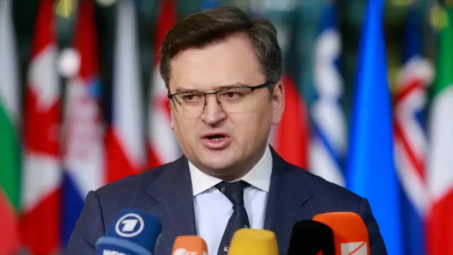 Ukraine"s Foreign Minister Dmytro Kuleba gives a press conference at the start of a meeting of NATO foreign ministers at NATO headquarters in Brussels, Belgium