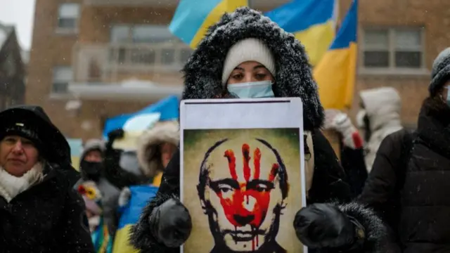 A protester in Montreal outside the Russian consulate in February