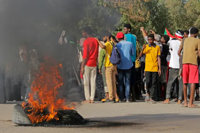 Sudanese protesters take part in a rally against military rule on the anniversary of previous popular uprisings, in the capital Khartoum on April 6, 2022