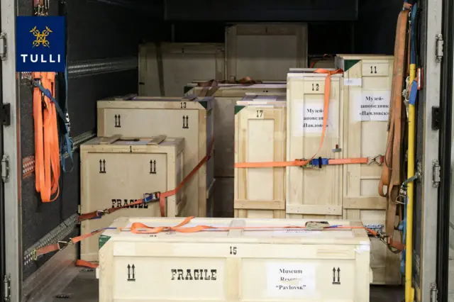 Picture of wooden shipments in the back of a truck