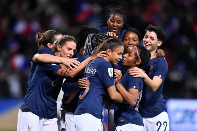 France players celebrate Kadidiatou Diani's opening goal against Wales