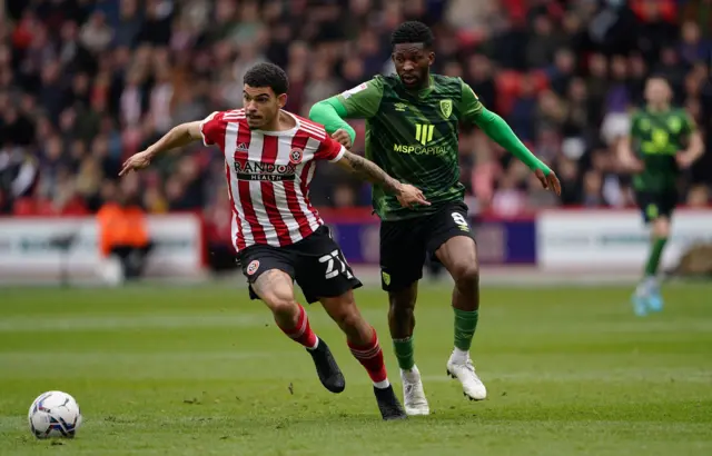 Morgan Gibbs-White drives forward for Sheffield United