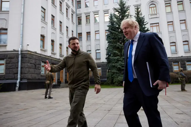 President Zelensky walks with prime minister Johnson outside