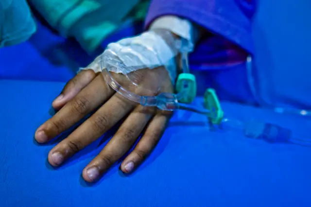 A child receives cancer treatment in a hospital.