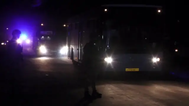 Still from video released by Russian Ministry of Defence purporting to show Mariupol evacuation convoy