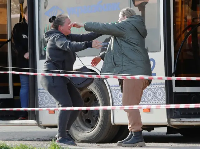 Azovstal steel plant employee Valeria, right, hugs her sister Aleksandra