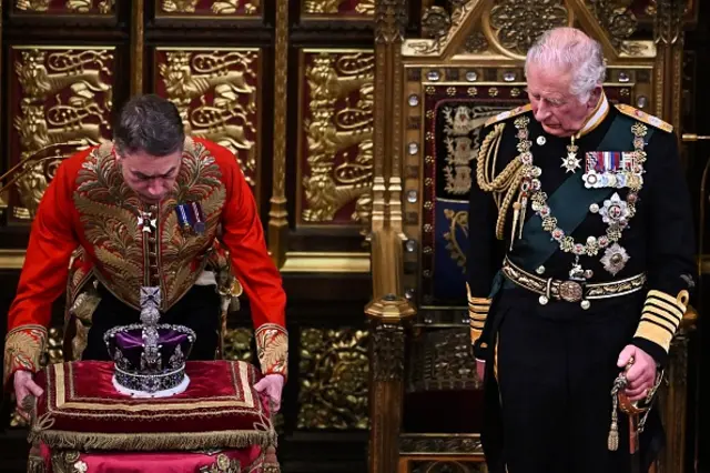 Prince Charles departs the House of Lords chamber after reading the Queen's Speech