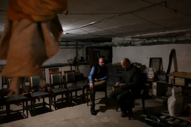 European Council President Charles Michel and Ukrainian Prime Minister Denys Shmyhal wait inside a bomb shelter amid air raid sirens in Odesa