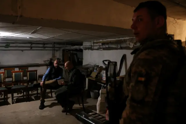 European Council President Charles Michel and Ukrainian Prime Minister Denys Shmyhal wait inside a bomb shelter as air raid sirens sound in Odesa