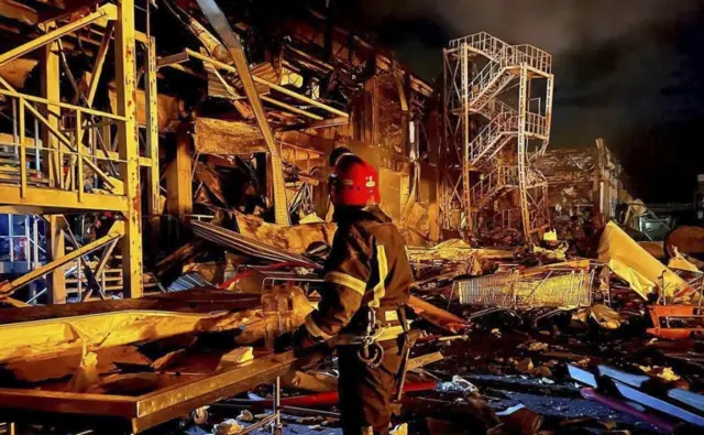 Rescue workers at the site of a missile strike in the southern Ukrainian port city of Odesa