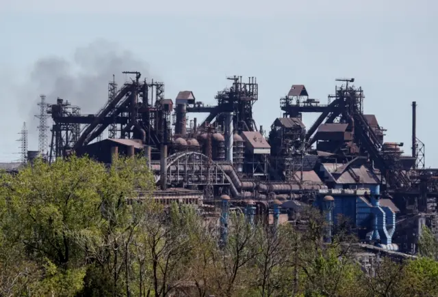 Smoke rises above a plant at the steelworks