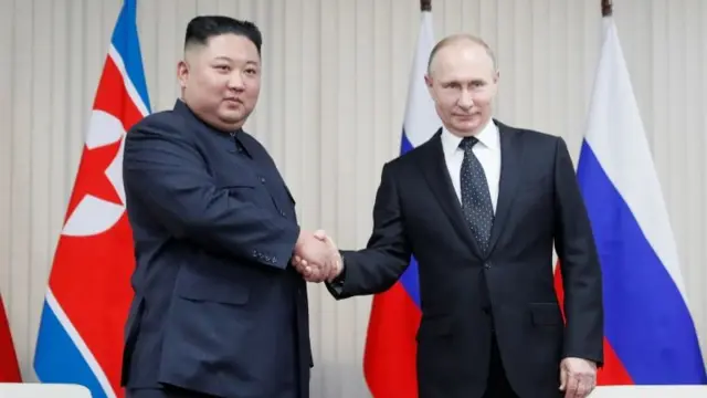 Russian President Vladimir Putin (R) and North Korean leader Kim Jong Un shakes hands during their talks at Far East Federal University on Russky Island in Vladivostok, Russia, April 25, 2019.