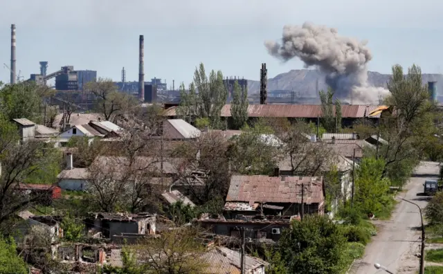 A view shows an explosion at a plant of Azovstal Iron and Steel Works during Ukraine-Russia conflict in the southern port city of Mariupol, Ukraine May 8, 2022