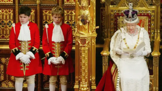 Queen Elizabeth II delivers her speech to members of the House of Lords and the House of Commons during the State Opening of Parliament in London, 26 November 2003