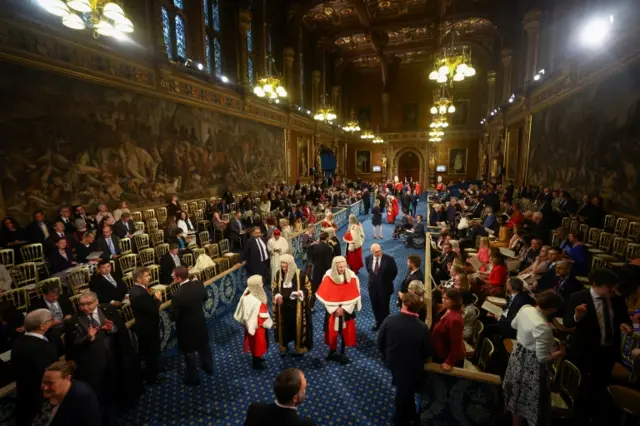 Invited guests take their seats at the Royal Gallery before the State Opening of Parliament