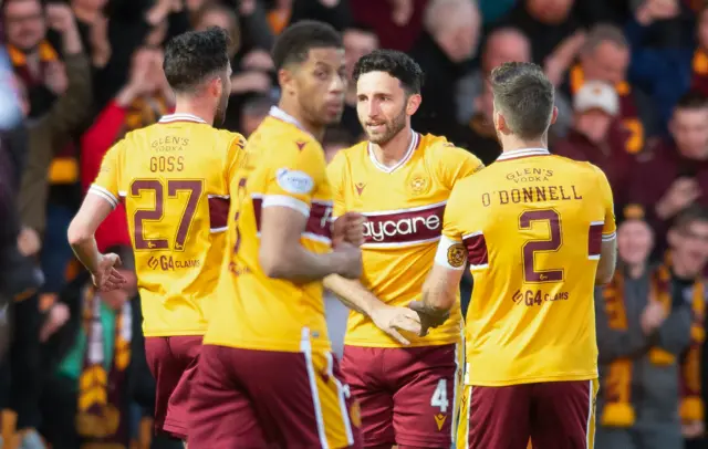 Ricki Lamie (second right) scored in the second half to win it for Motherwell