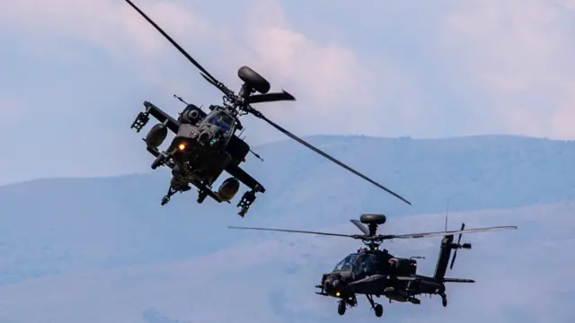 Two US apache helicopters