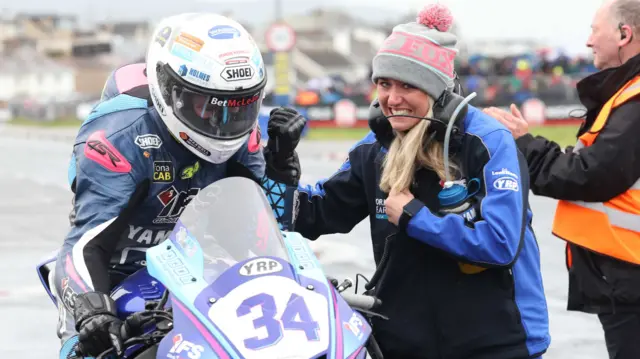 Alastair Seeley's wife Danni enjoys his Supersport win