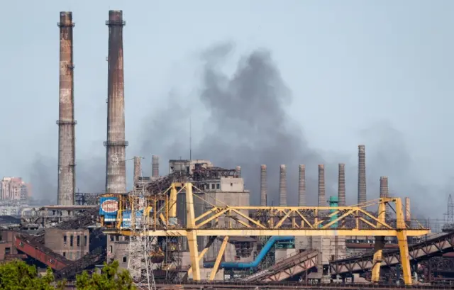 Smoke rises above the Azovstal steelworks plant in Mariupol