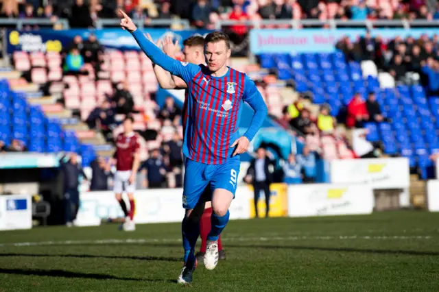 Billy Mckay celebrates scoring against Arbroath in March