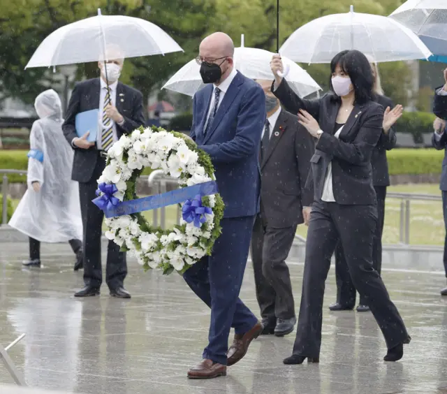 European Council President Charles Michel offers a wreath to the cenotaph for the victims of the 1945 atomic bombing