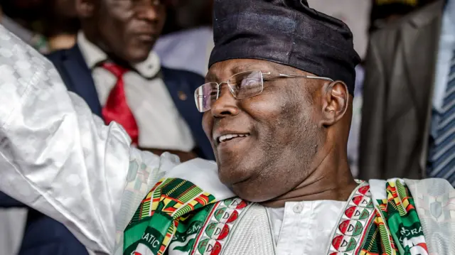 Nigerian politician, Atiku Abubakar, waving