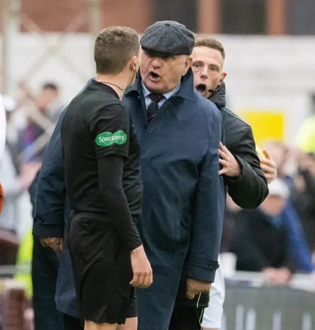 Dick Campbell remonstrates with the fourth official