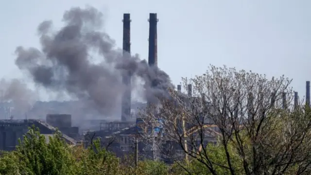 Smoke rises from the industrial steelworks of Azovstal