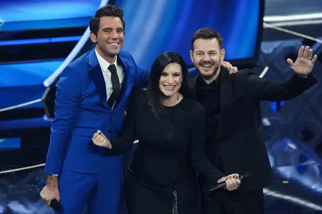 Mika and Eurovision co-presenters Alessandro Cattelan and Laura Pausini