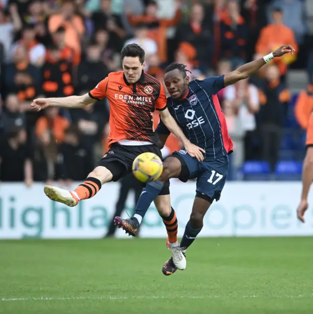 Liam Smith and Regan Charles-Cook challenge for the ball