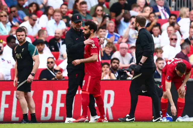 Jurgen Klopp and Mohamed Salah.