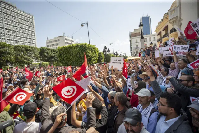 A group of people gather outside Municipal Theater to protest Tunisian President Kais Saied in Tunis, Tunisia on May 15, 2022.