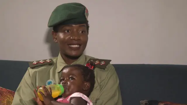 Army Captain Mwila Chansa with baby Thabo