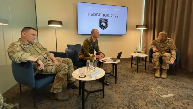 Military members attending a briefing for Exercise Hedgehog