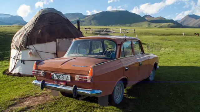 Moskvich car next to a Kyrgyz yurt