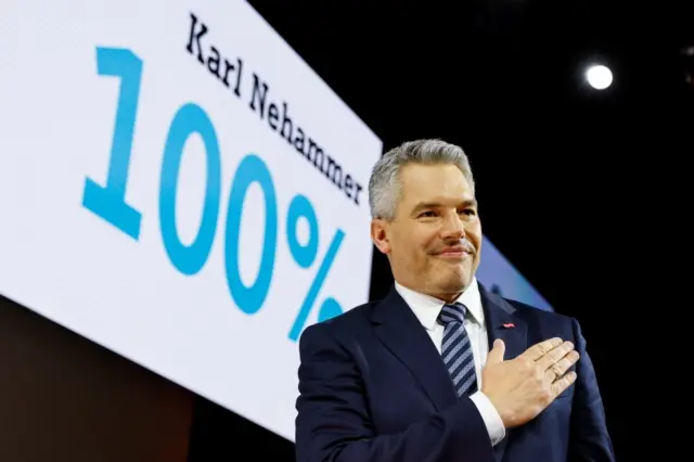 Austria"s Chancellor Karl Nehammer reacts after being elected chairman of the Austrian People"s Party (OeVP), in Austria on 14 May