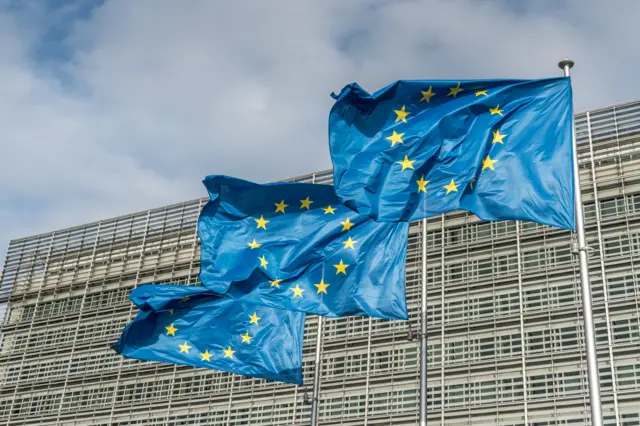 EU flags outside the European Commission building