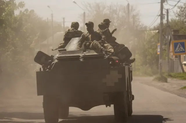 Ukrainian soldiers in an armoured vehicle