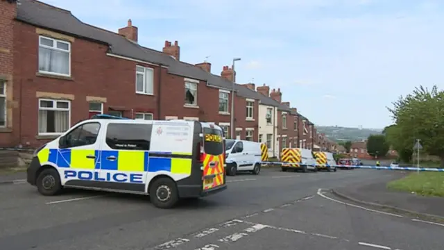 Police vehicles at the scene