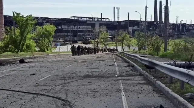 Members of Ukrainian forces who have surrendered after weeks holed up at Azovstal steelworks