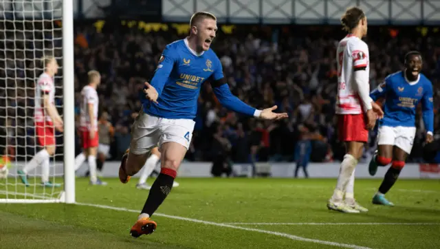 John Lundstram celebrates his decisive goal against RB Leipzig at Ibrox