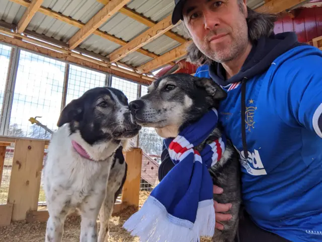 Grant with his huskies