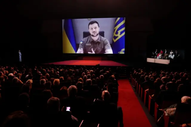 Ukrainian President Volodymyr Zelensky address the Cannes film festival on Tuesday