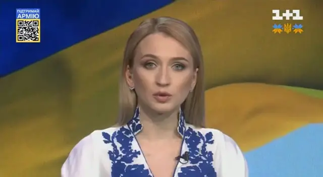 Ukrainian television presenter in embroidered shirt on 1+1 TV channel