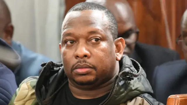 Nairobi's Governor Mike Sonko sits in a court room during a hearing after he was arrested on corruption-related charges, at the Milimani Law Courts in Nairobi, on December 9, 2019